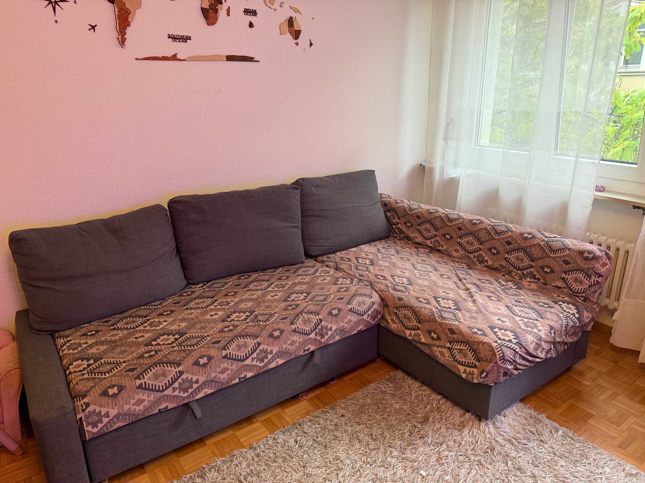 Corner sofa, dark grey with geometric pattern