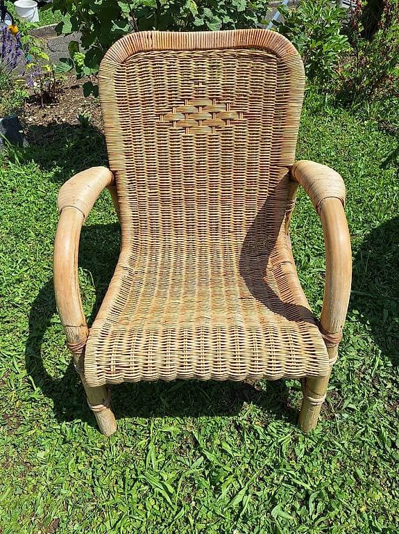 Cooler bequemer älterer Rattan-Sessel