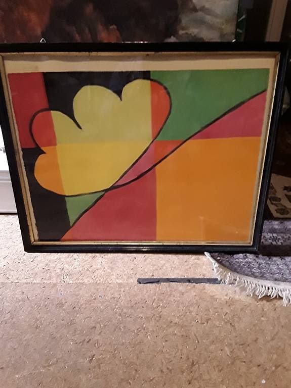 Bild mit Rahmen hinter Glasplatte