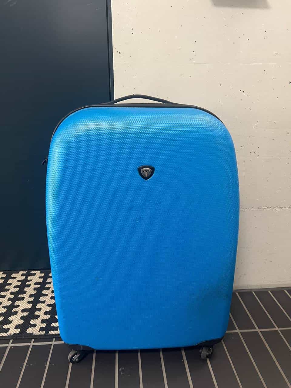 Blauer Reisekoffer